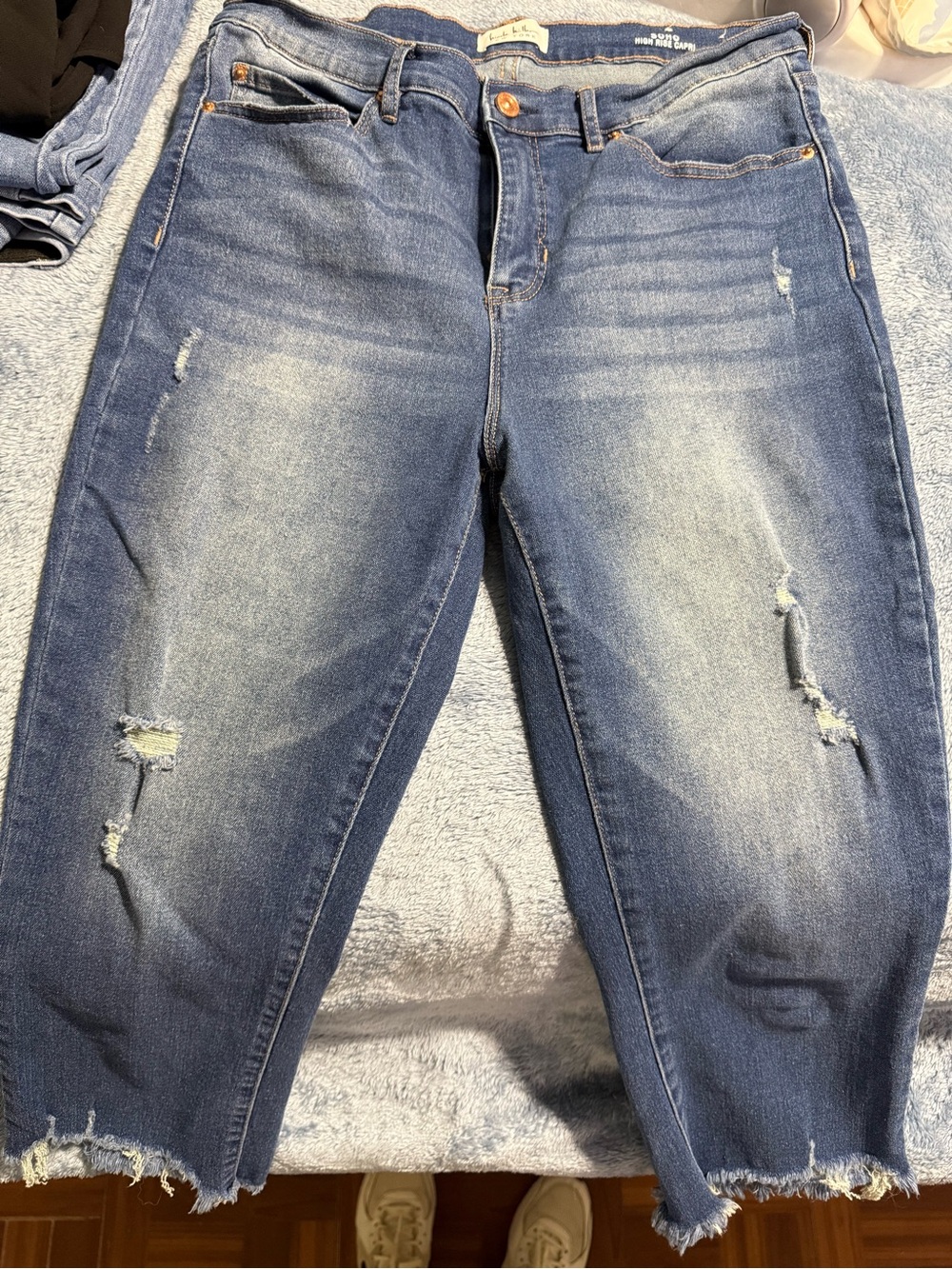 Women’s Distressed Mid-Wash Blue Jeans